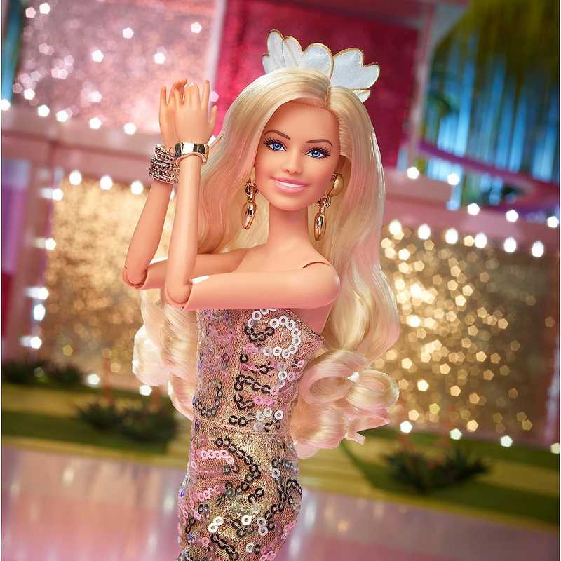 Barbie™ The Movie Doll, Margot Robbie as, Collectible Doll Wearing Gold Disco Jumpsuit with Glossy Curls and Golden Heels for Girls 3-12 Years